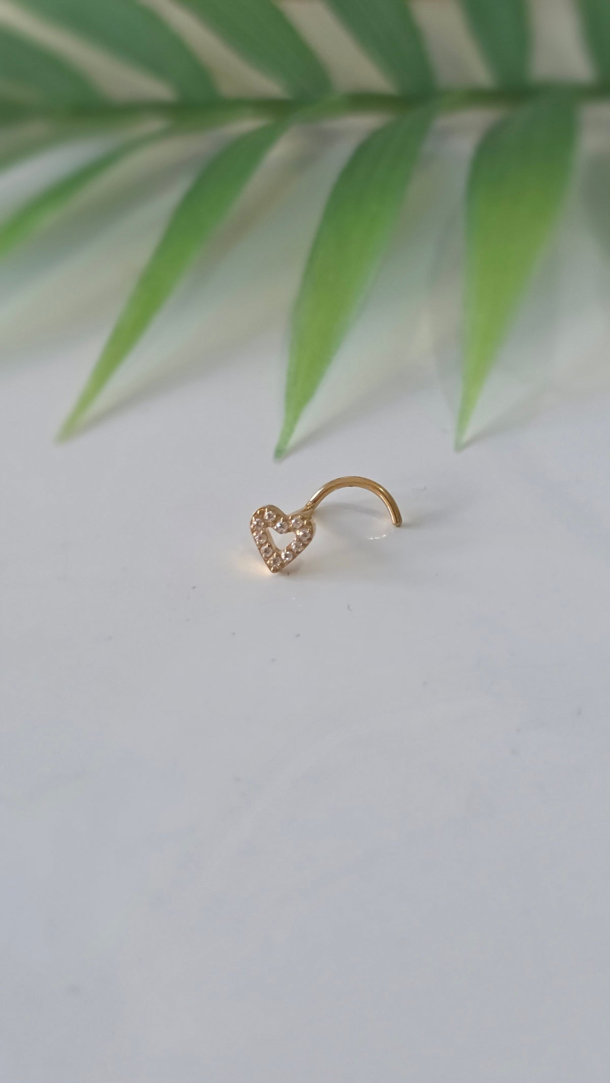 Piercing nez coeur tire bouchon